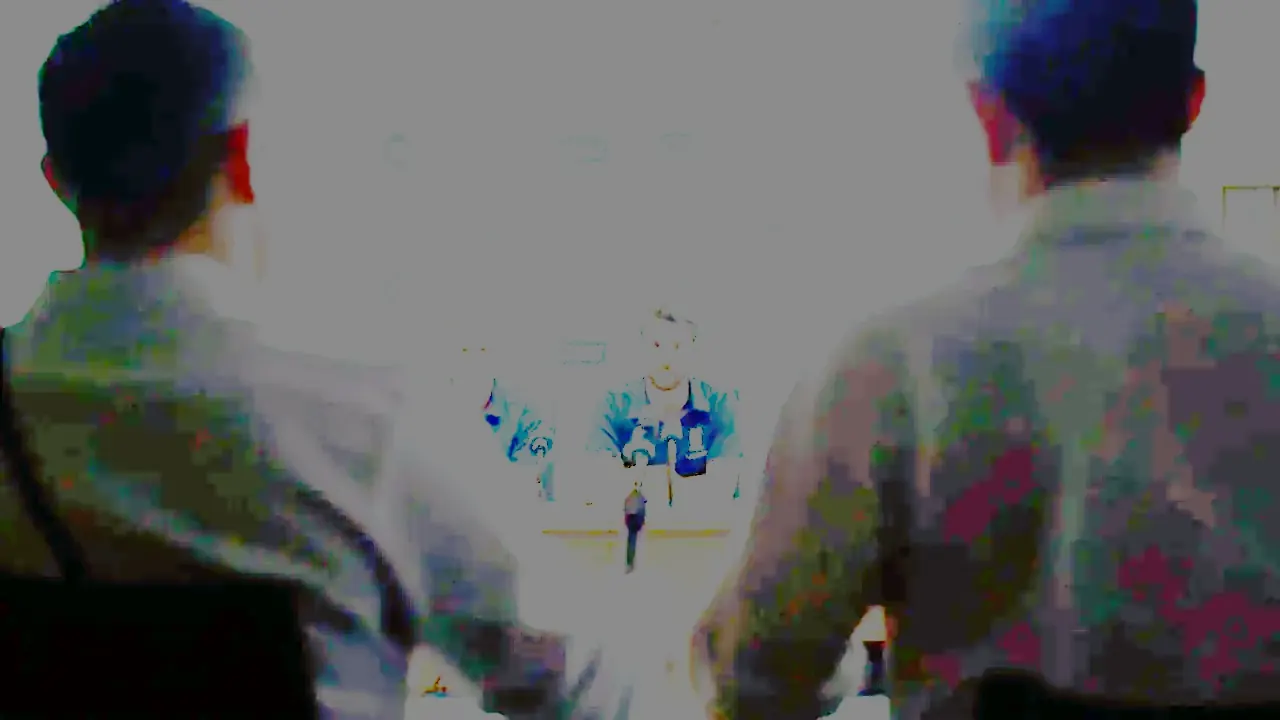 Press conference room with two cricket players at the microphone